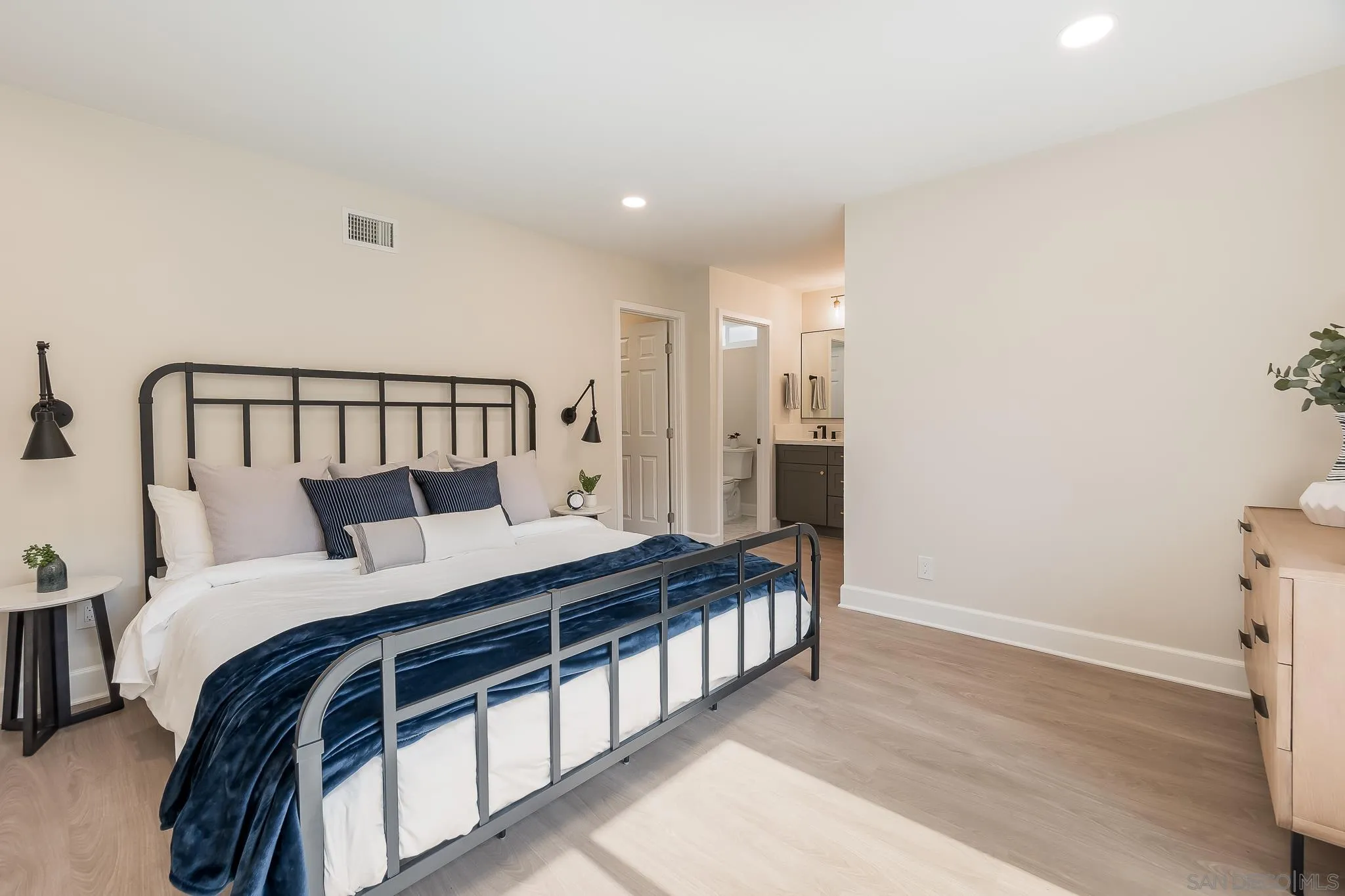8510 Lepus Road San Diego, CA 92126 - Photo 18 of 35 a bedroom with a bed and a window