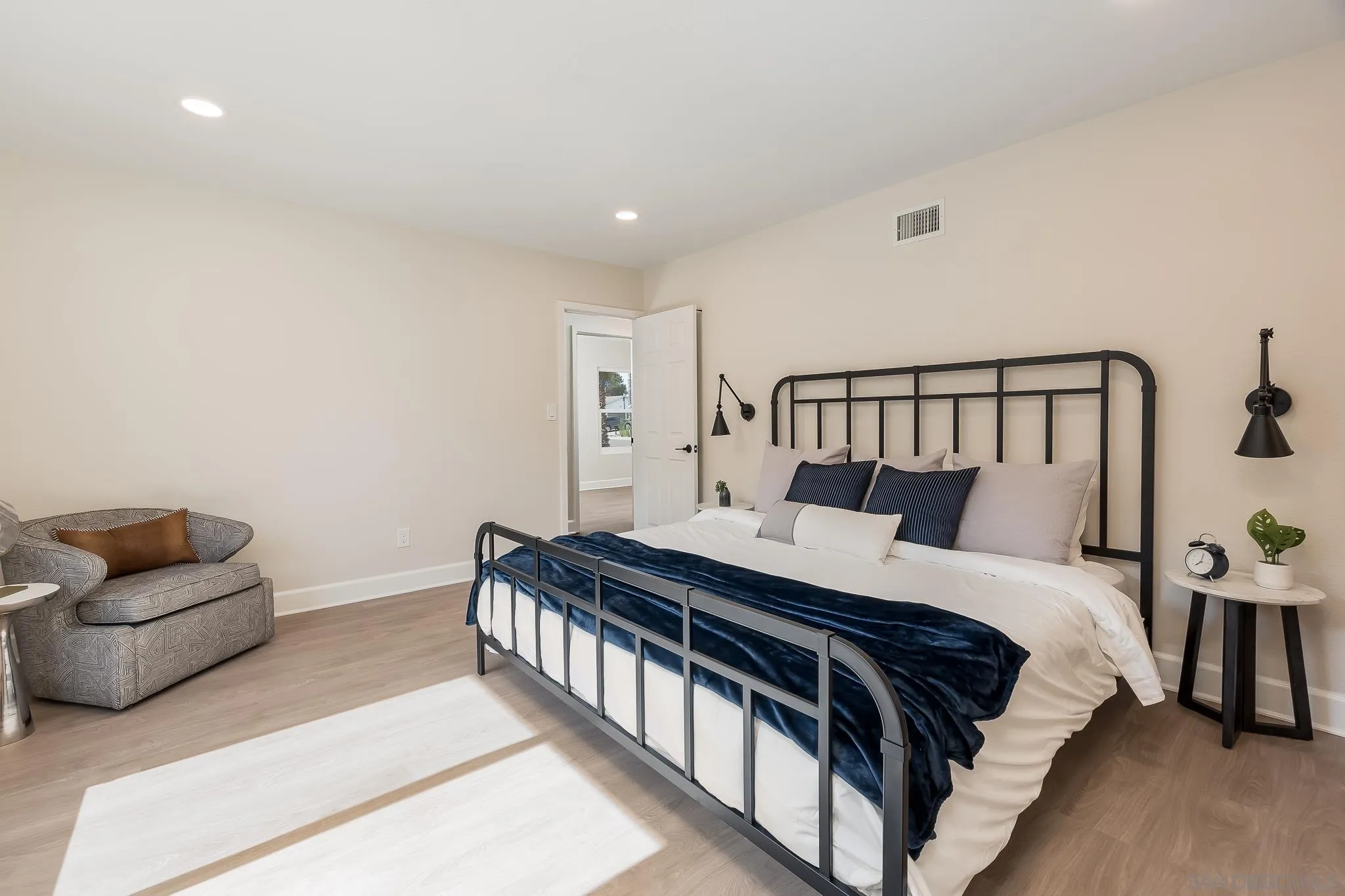 8510 Lepus Road San Diego, CA 92126 - Photo 19 of 35 a bedroom with a bed and a couch