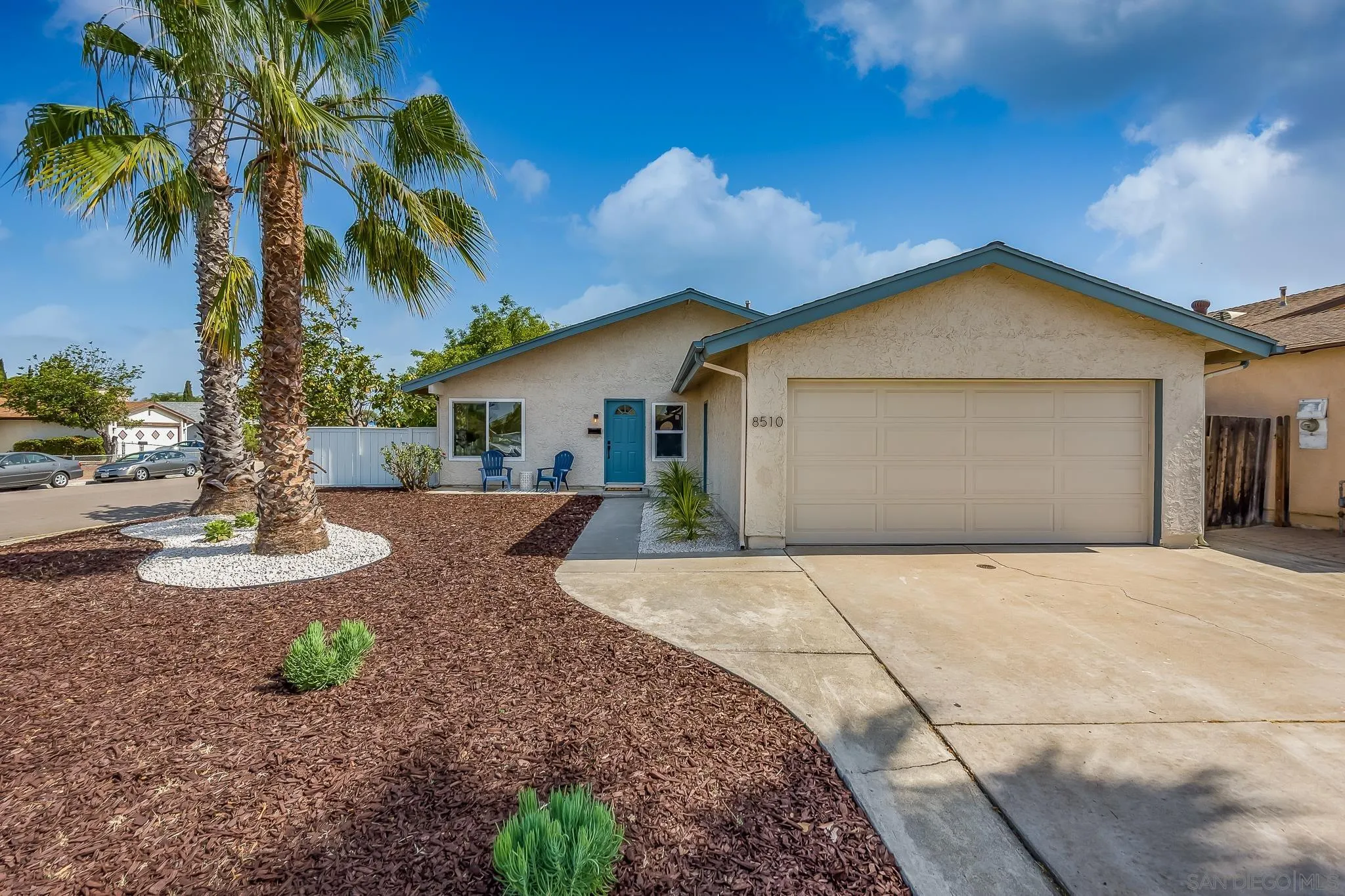 8510 Lepus Road San Diego, CA 92126 - Photo 2 of 35 a front view of a house with garden