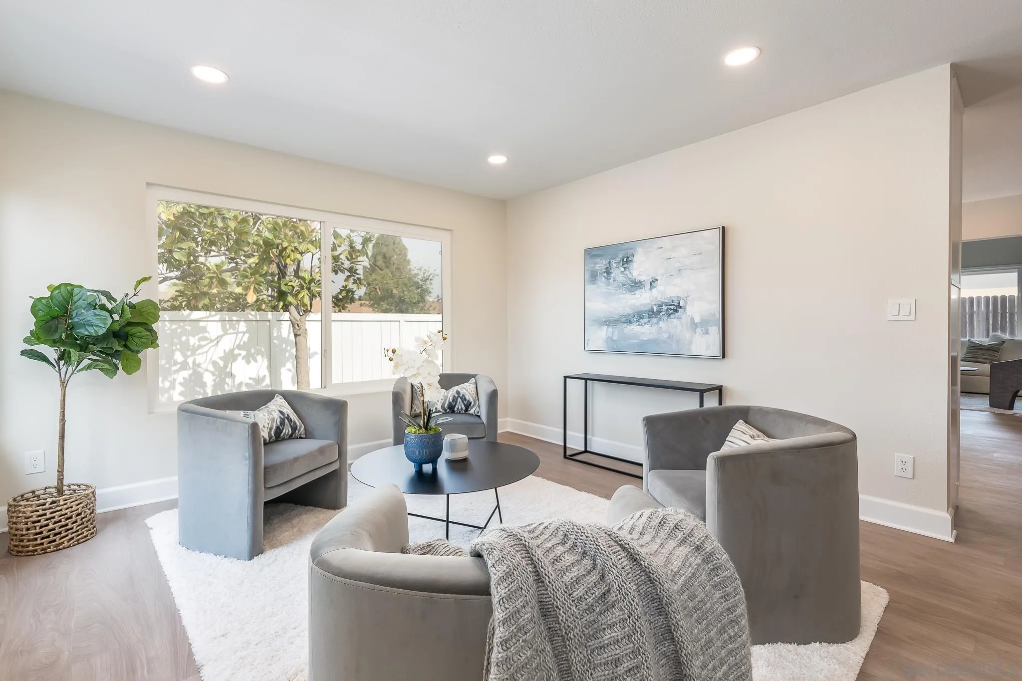 8510 Lepus Road San Diego, CA 92126 - Photo 7 of 35 a living room with furniture and a large window