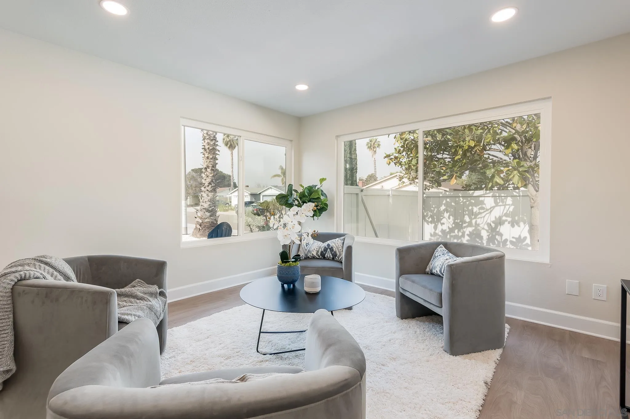 8510 Lepus Road San Diego, CA 92126 - Photo 8 of 35 a living room with furniture and a large window