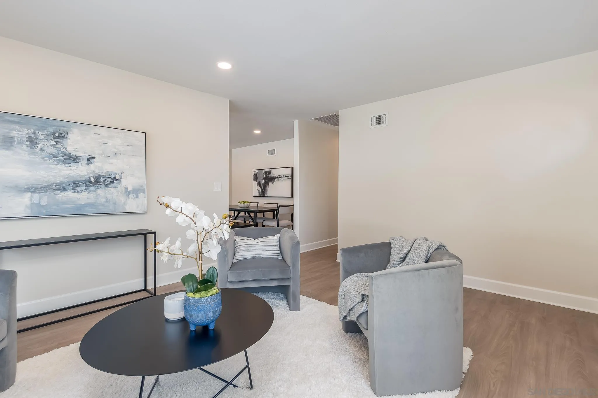 8510 Lepus Road San Diego, CA 92126 - Photo 9 of 35 a living room with furniture and a potted plant