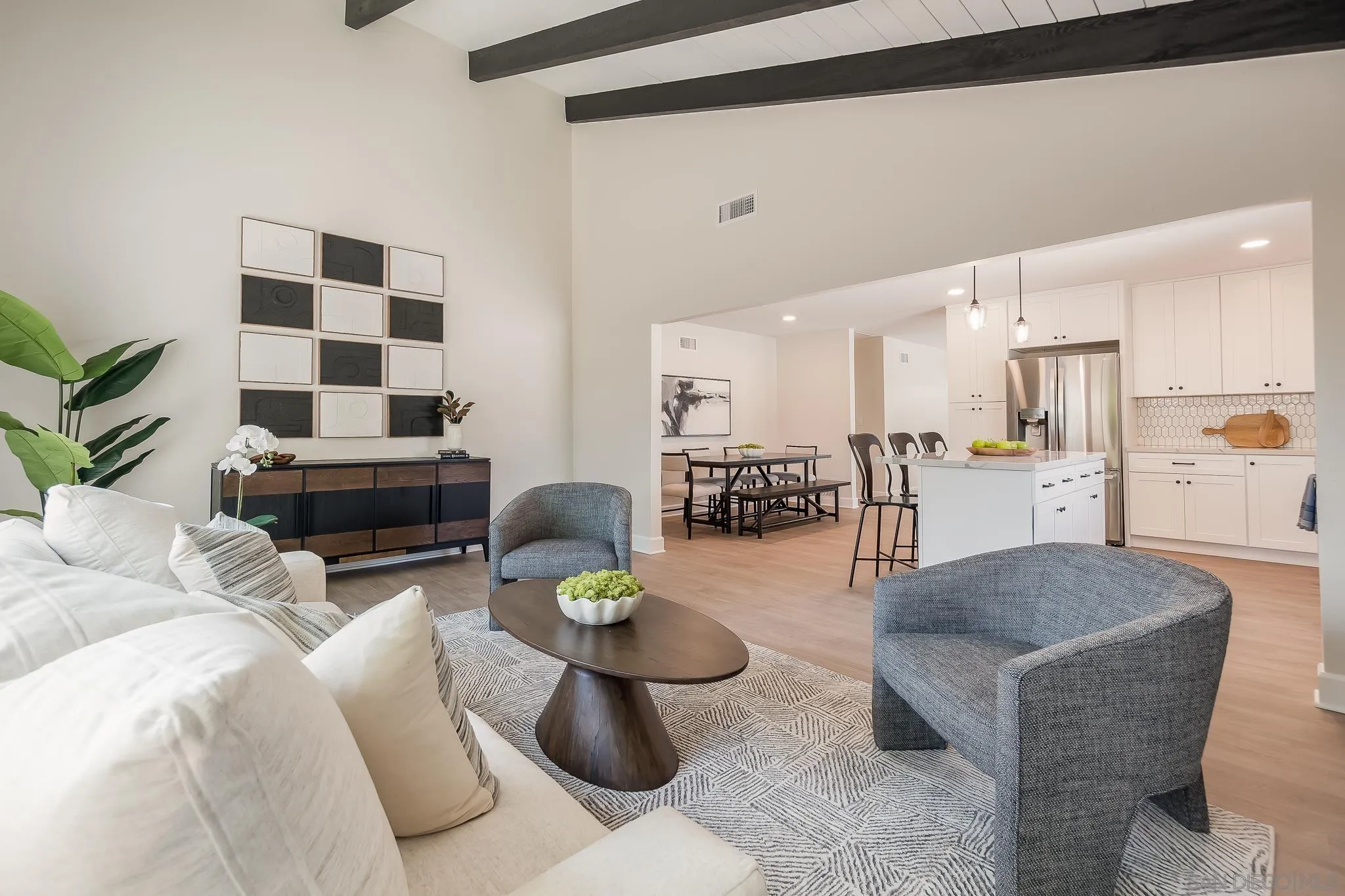 8510 Lepus Road San Diego, CA 92126 - Photo 10 of 35 a living room with furniture and wooden floor