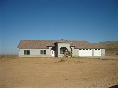 9283 Bowen Ranch Road Apple Valley, CA 92308 - Photo 1 of 1 a house view with a outdoor space