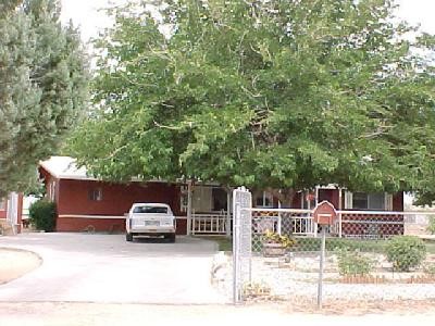 15047 Flathead Road Apple Valley, CA 92307 - Photo 1 of 1 a house view with a backyard space