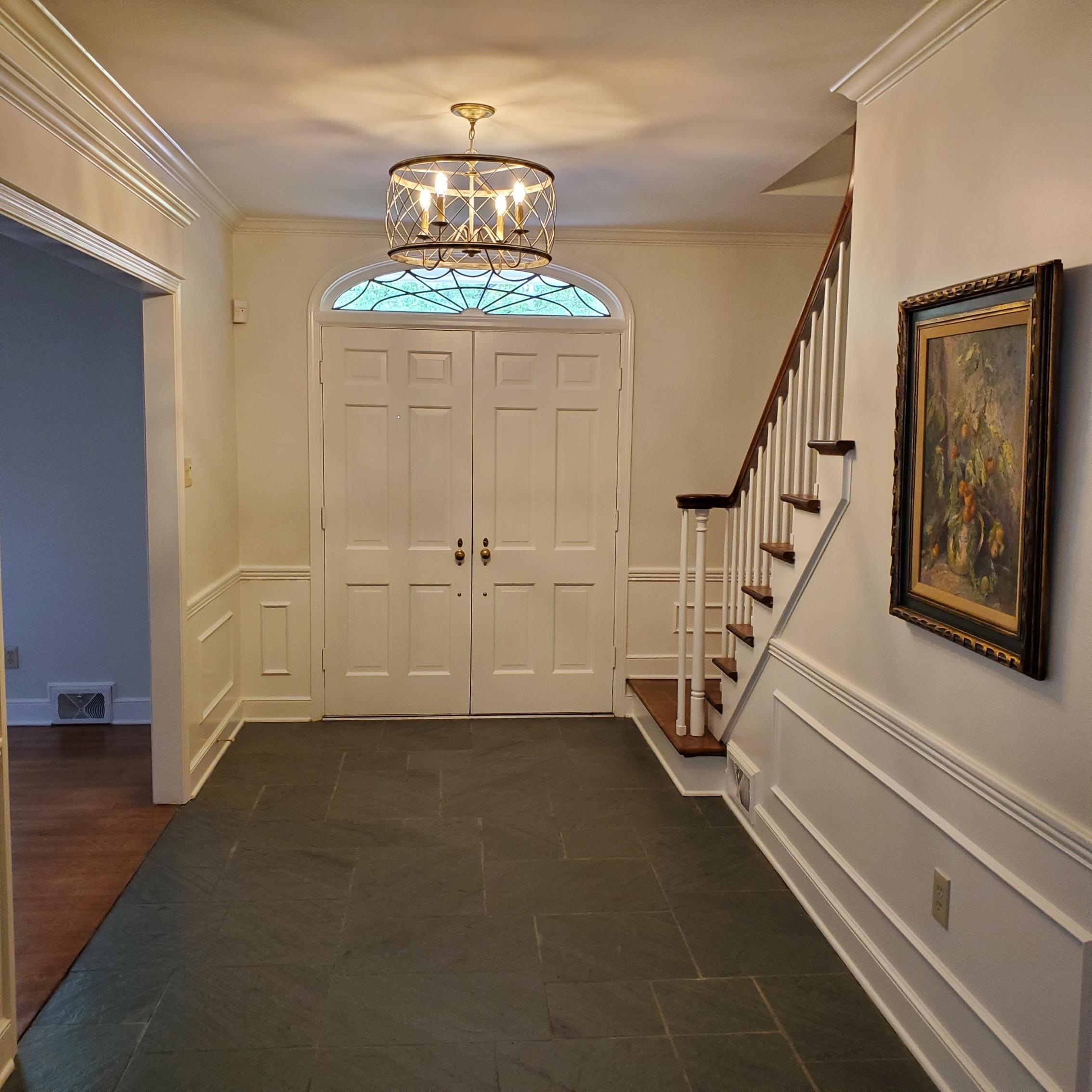 195 South Grove Park Road Memphis, TN 38117 - Photo 2 of 25 a view of a livingroom with wooden floor and stairs