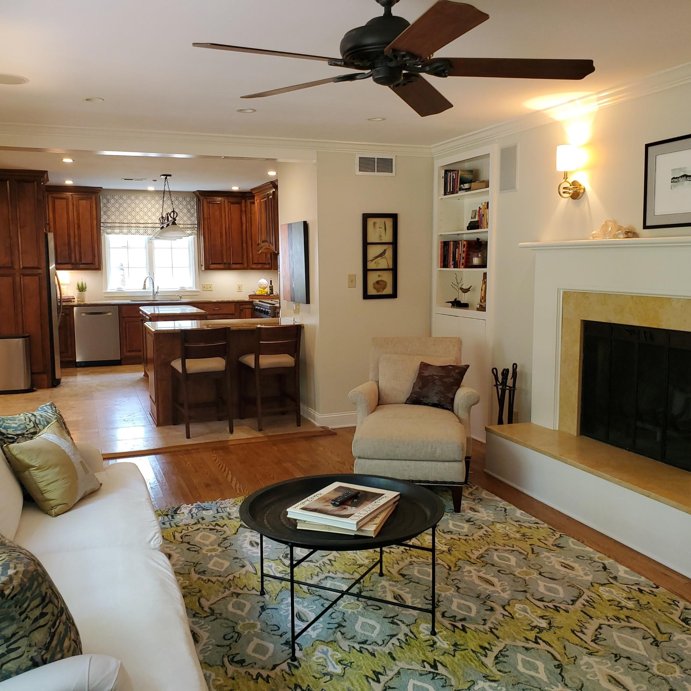 195 South Grove Park Road Memphis, TN 38117 - Photo 9 of 25 a living room with furniture a fireplace and a flat screen tv
