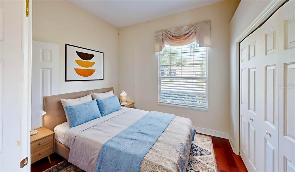 586 Huntington Pines Drive Ocoee, FL 34761 - Photo 13 of 51 a bedroom with bed and a window