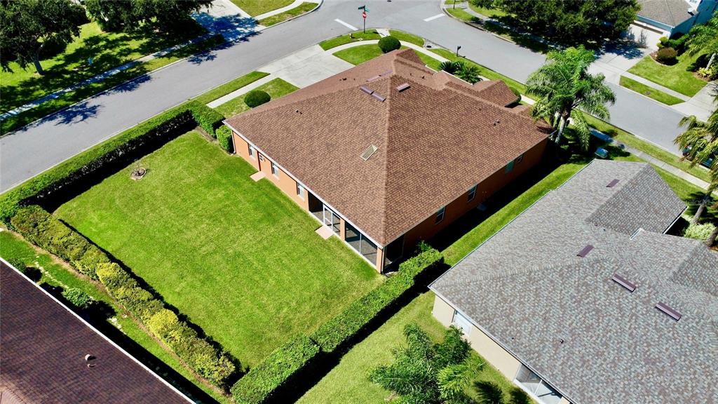 586 Huntington Pines Drive Ocoee, FL 34761 - Photo 17 of 51 a view of a backyard with plants