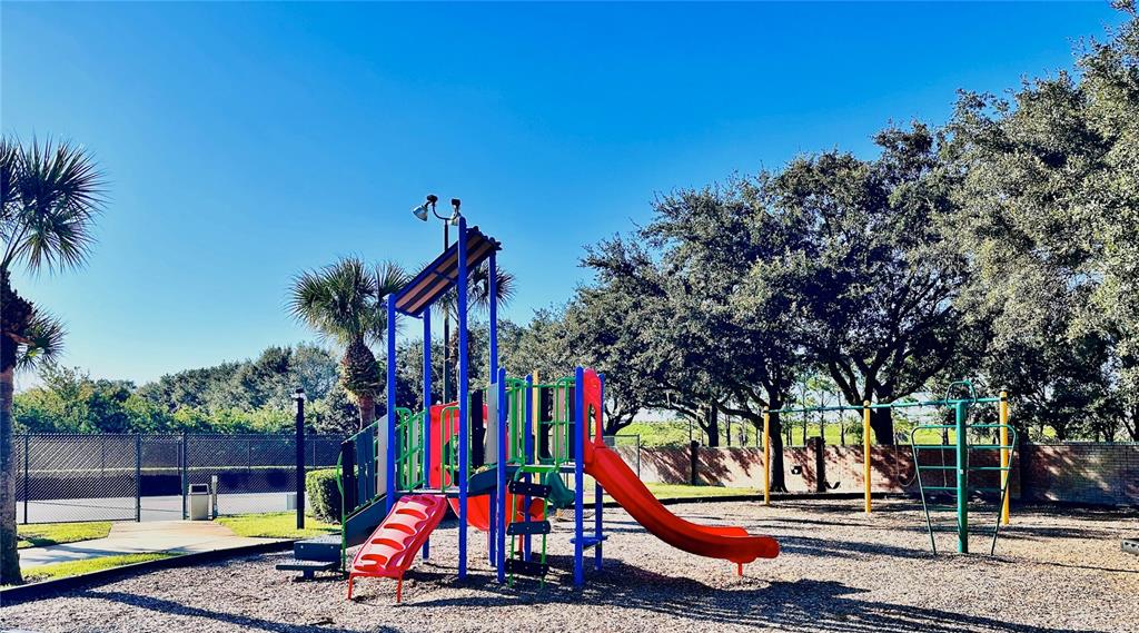586 Huntington Pines Drive Ocoee, FL 34761 - Photo 21 of 51 a view of outdoor space with garden and entertaining space