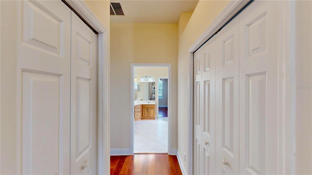 586 Huntington Pines Drive Ocoee, FL 34761 - Photo 34 of 51 a view of an entryway with wooden floor and door