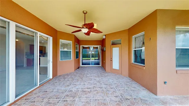 an aerial view of house with yard