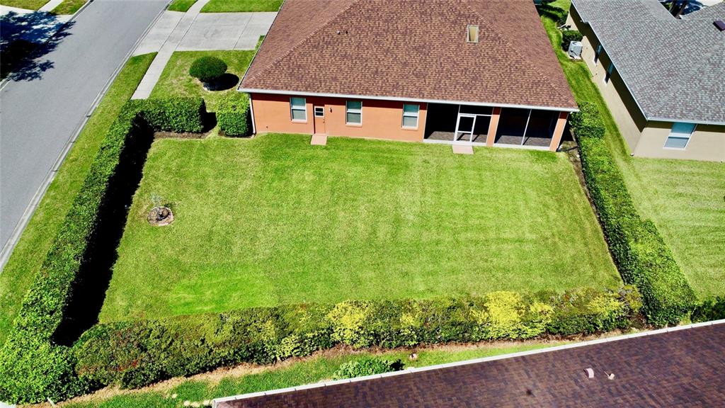586 Huntington Pines Drive Ocoee, FL 34761 - Photo 45 of 51 an aerial view of house with yard