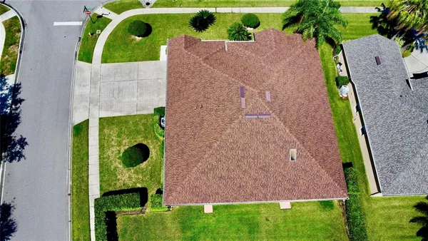an aerial view of a house with a garden