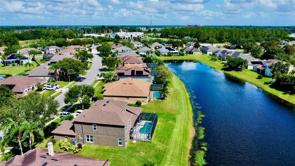 586 Huntington Pines Drive Ocoee, FL 34761 - Photo 49 of 51 an aerial view of a house with a garden