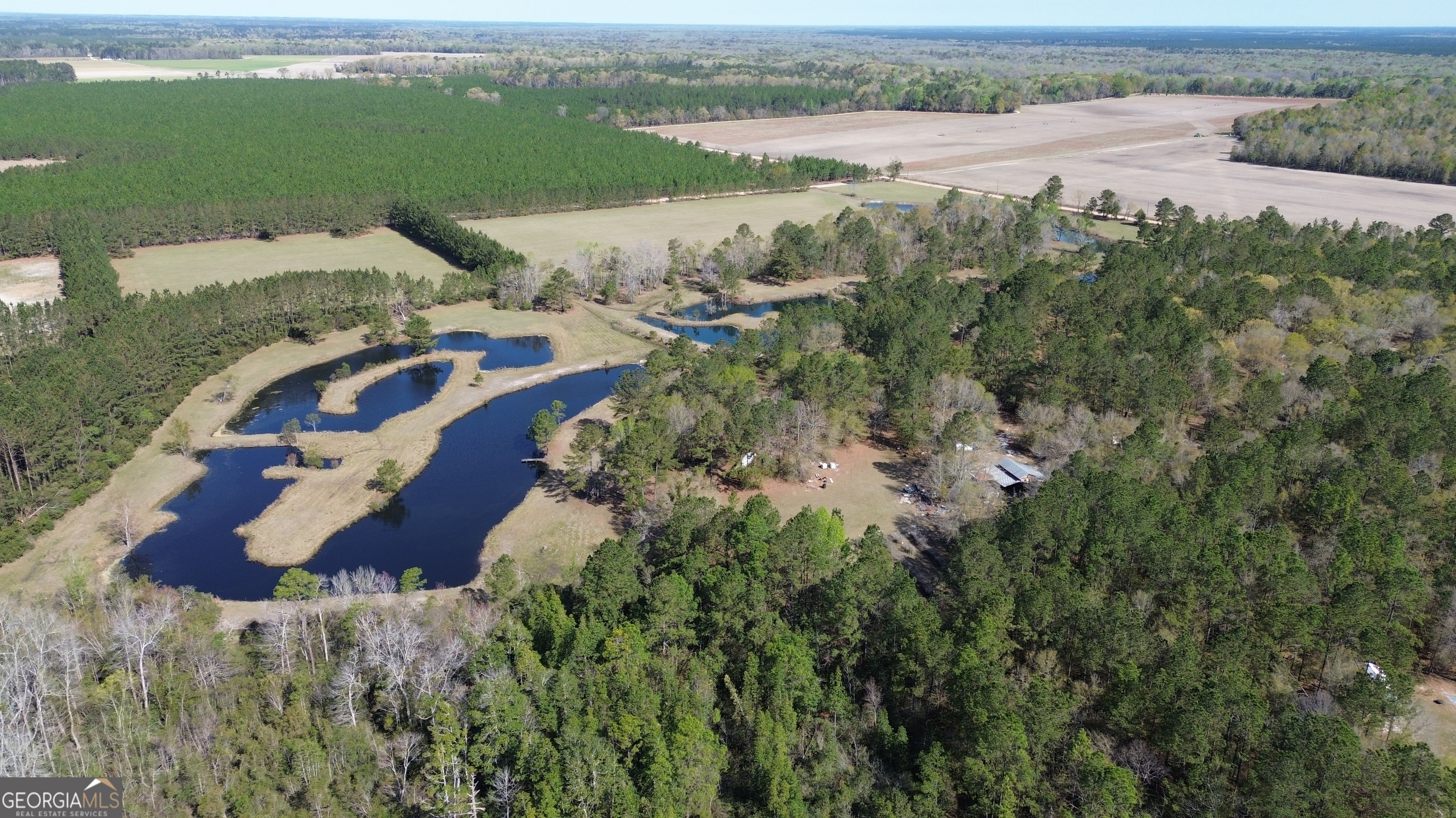 680 Porter's Landing Road Clyo, GA 31303 - Photo 40 of 50 an aerial view of a house with a lake view
