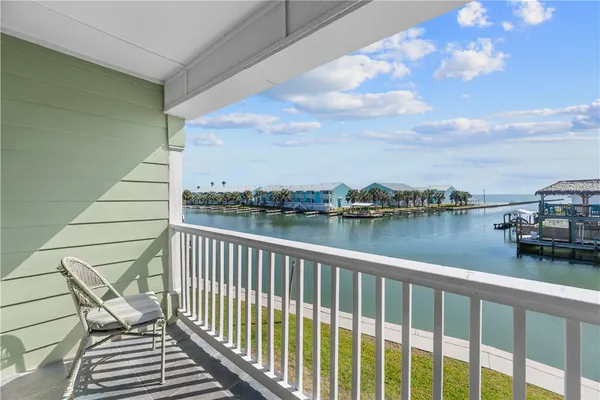 a view of a balcony with lake view