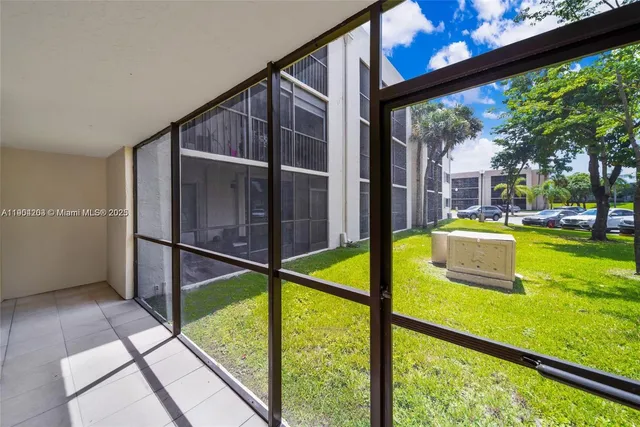a view of swimming pool from a window