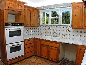 857 Cheltenham Road Santa Barbara, CA 93105 - Photo 3 of 9 a kitchen with granite countertop cabinets stainless steel appliances and a counter space