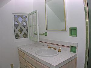 857 Cheltenham Road Santa Barbara, CA 93105 - Photo 8 of 9 a bathroom with a sink and a mirror
