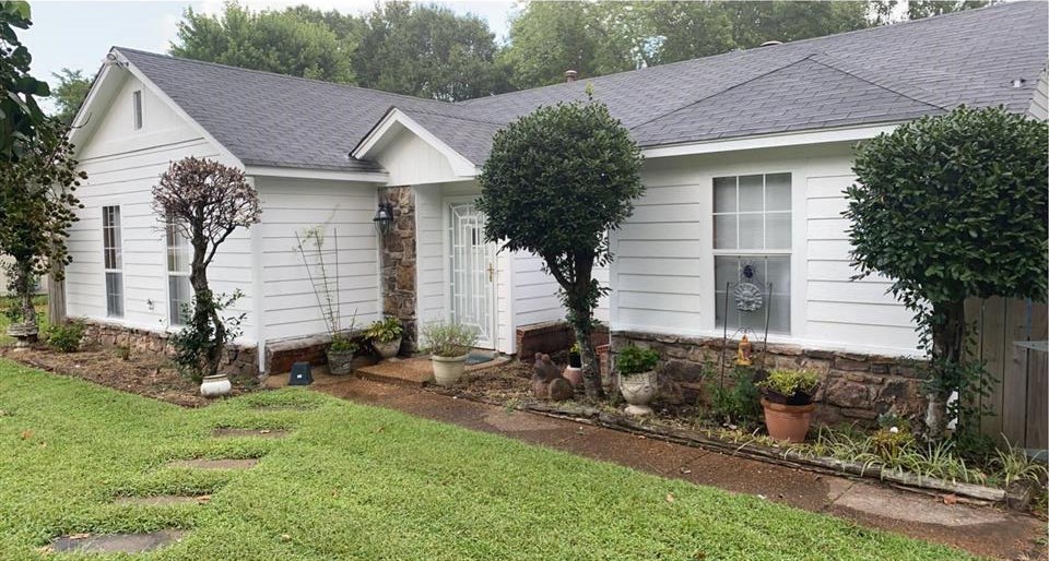 3894 Ross Road Memphis, TN 38115 - Photo 1 of 11 a front view of a house with a yard