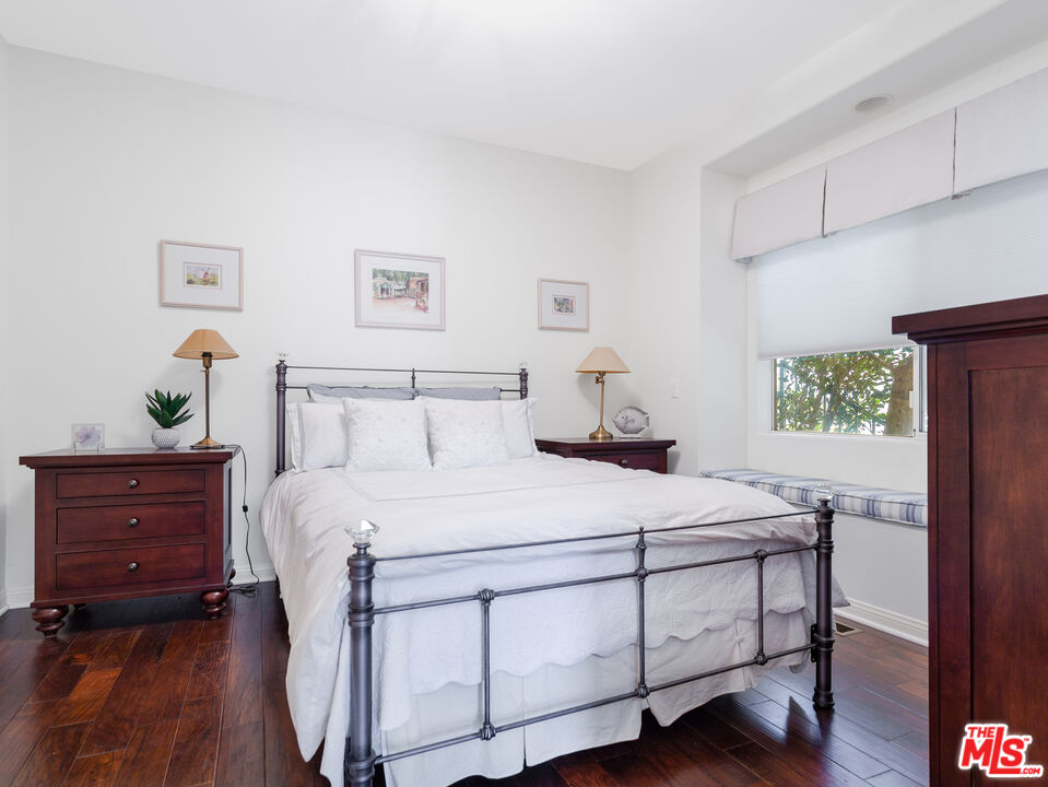 4324 Hillview Drive Malibu, CA 90265 - Photo 20 of 24 a bedroom with a bed and a window