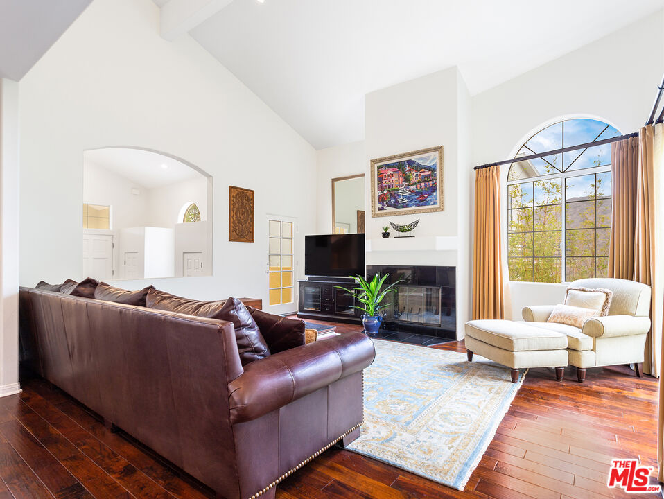 4324 Hillview Drive Malibu, CA 90265 - Photo 7 of 24 a living room with furniture and a fireplace