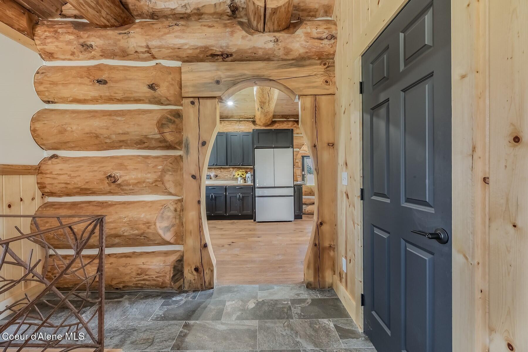 158 West Mountain Vw Road Moyie Springs, ID 83845 - Photo 28 of 63 Arched Log Door way