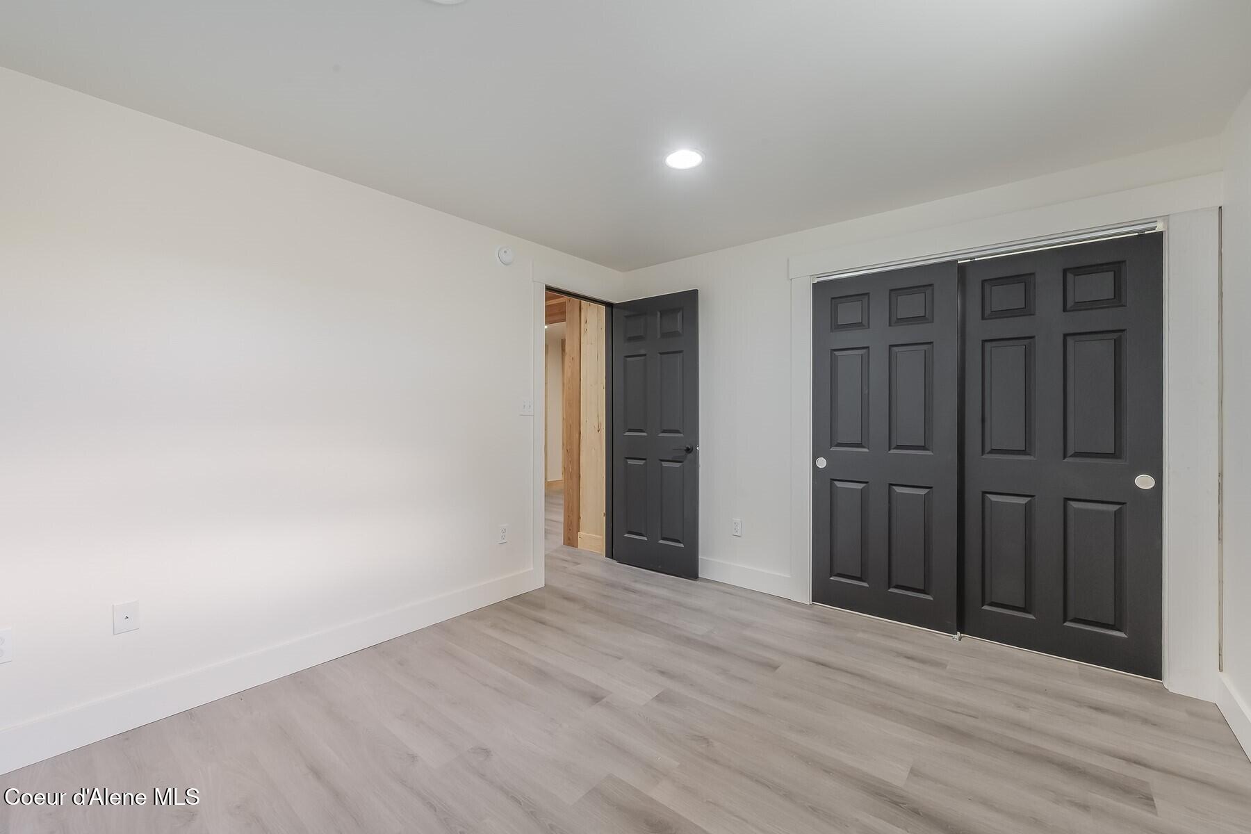 158 West Mountain Vw Road Moyie Springs, ID 83845 - Photo 33 of 63 Lower Level Bedroom 2