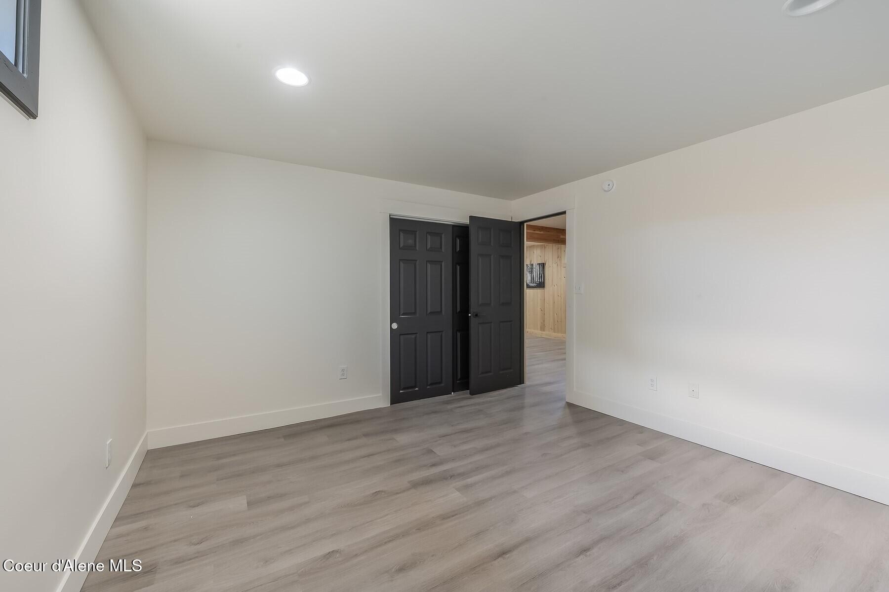 158 West Mountain Vw Road Moyie Springs, ID 83845 - Photo 34 of 63 Lower Level Bedroom 3