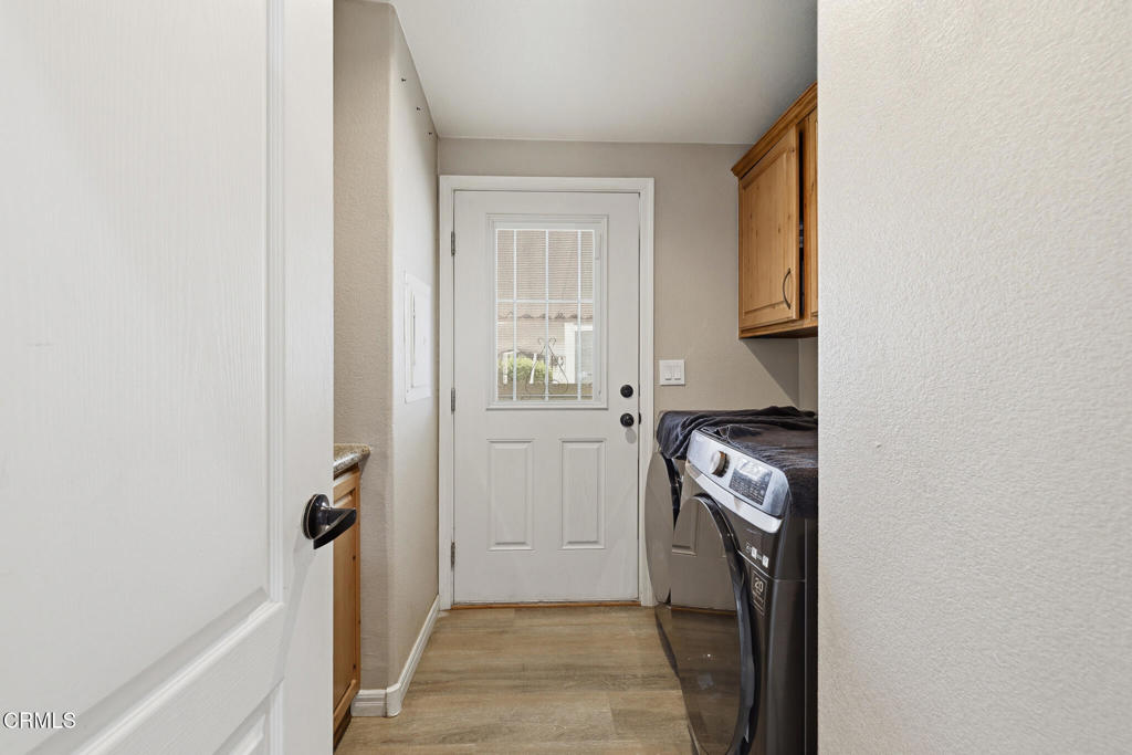 1657 Lime Avenue, Unit 87 Oxnard, CA 93033 - Photo 15 of 37 a view of a storage & utility room with a washer and dryer