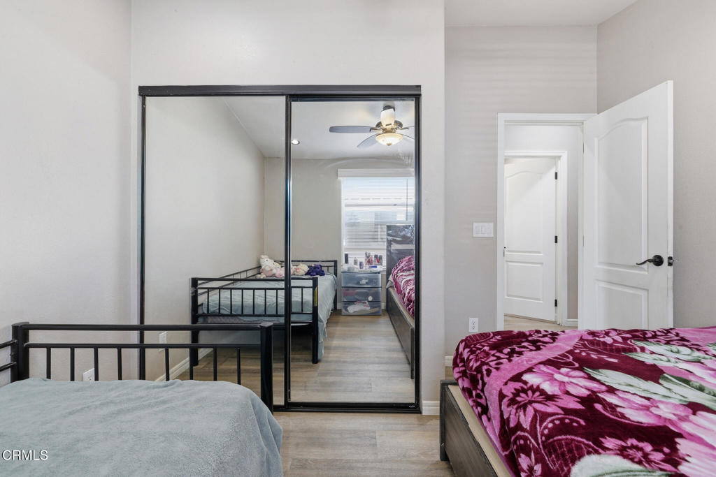 1657 Lime Avenue, Unit 87 Oxnard, CA 93033 - Photo 17 of 37 a bedroom with a bed and a table