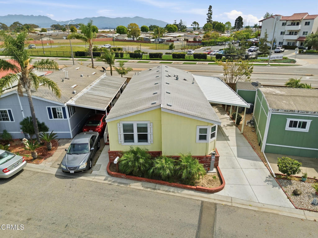 1657 Lime Avenue, Unit 87 Oxnard, CA 93033 - Photo 33 of 37 an aerial view of a house with garden space and street view