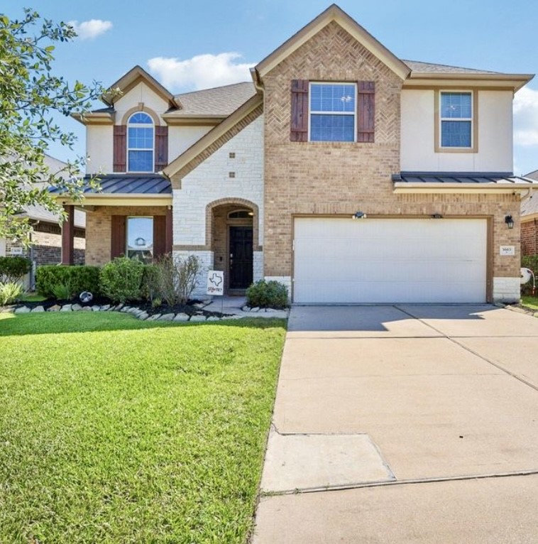 3663 Cottage Pines Lane Spring, TX 77386 - Photo 2 of 47 a front view of a house with garden