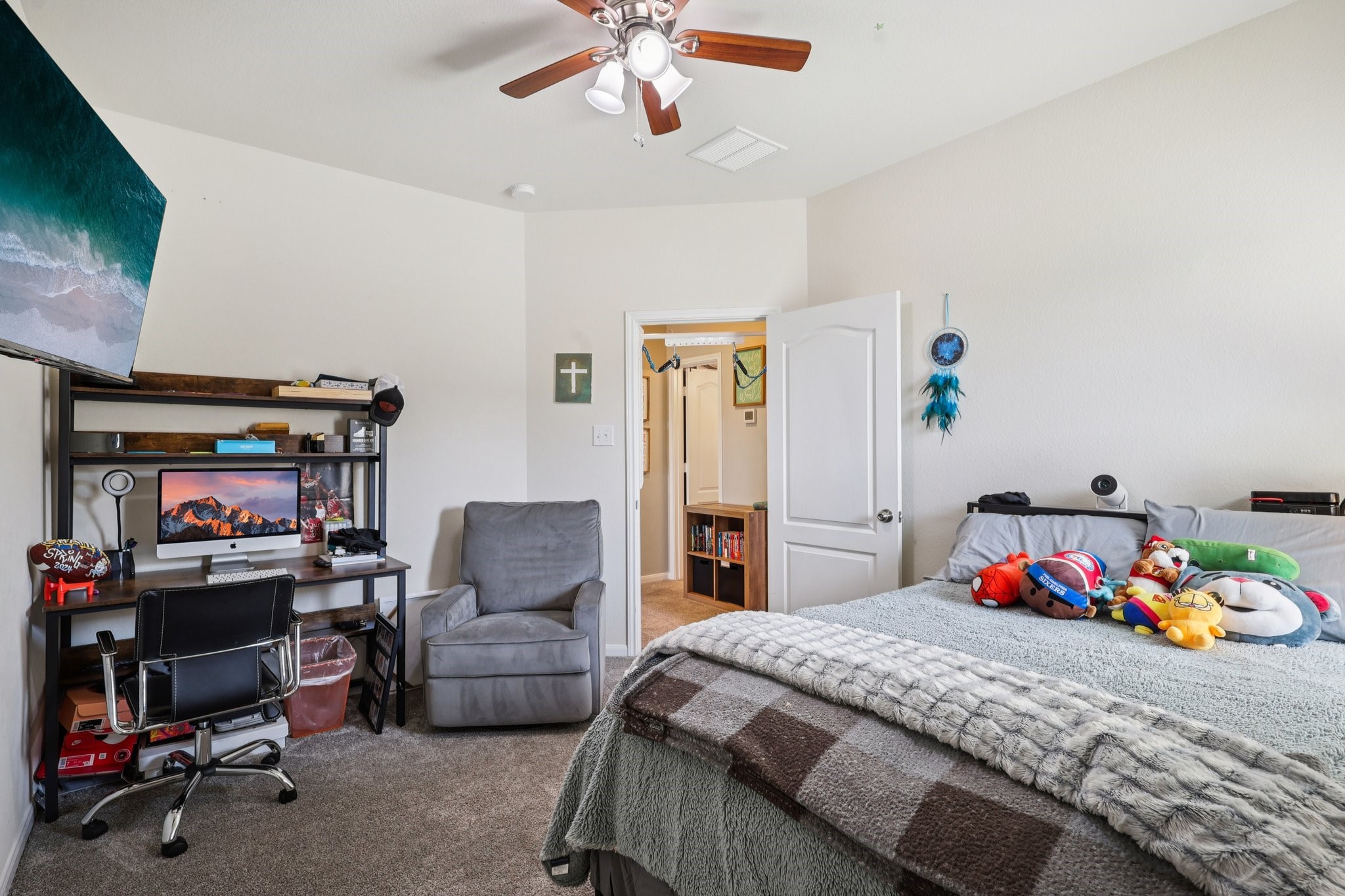 3663 Cottage Pines Lane Spring, TX 77386 - Photo 29 of 47 a bedroom with a bed and a couch