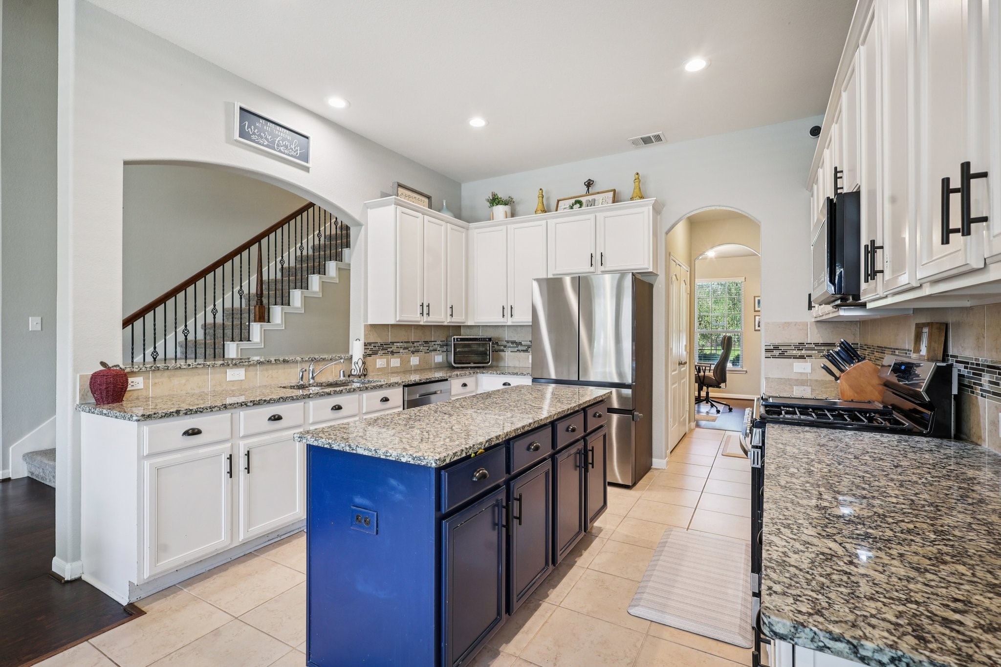 3663 Cottage Pines Lane Spring, TX 77386 - Photo 10 of 47 a kitchen with stainless steel appliances granite countertop a refrigerator a stove and a sink
