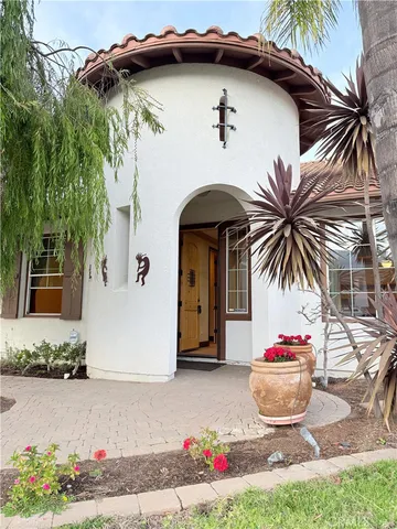 a front view of a house with yard