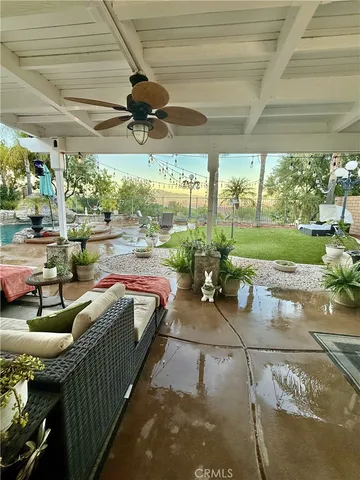 a view of a porch and garden