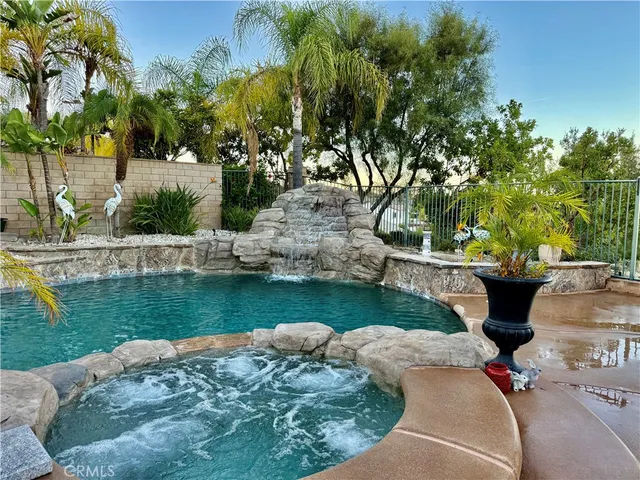 a view of a lake with a house in the background