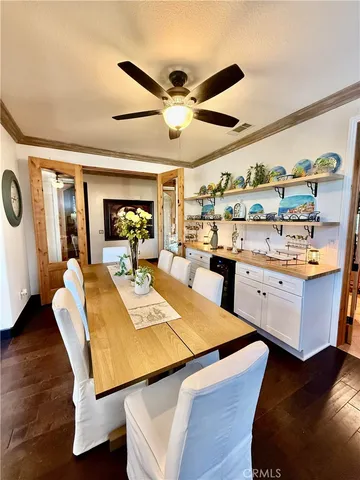 a kitchen with a table and chairs