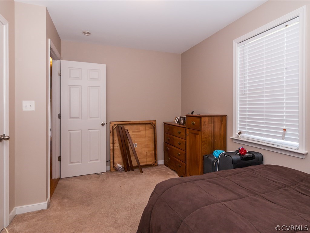 7311 Railroad Bed Road Carson, VA 23830 - Photo 17 of 23 a bed room with a bed and a closet