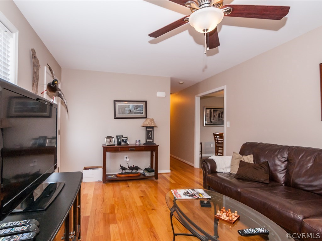 7311 Railroad Bed Road Carson, VA 23830 - Photo 5 of 23 a living room with furniture and a flat screen tv