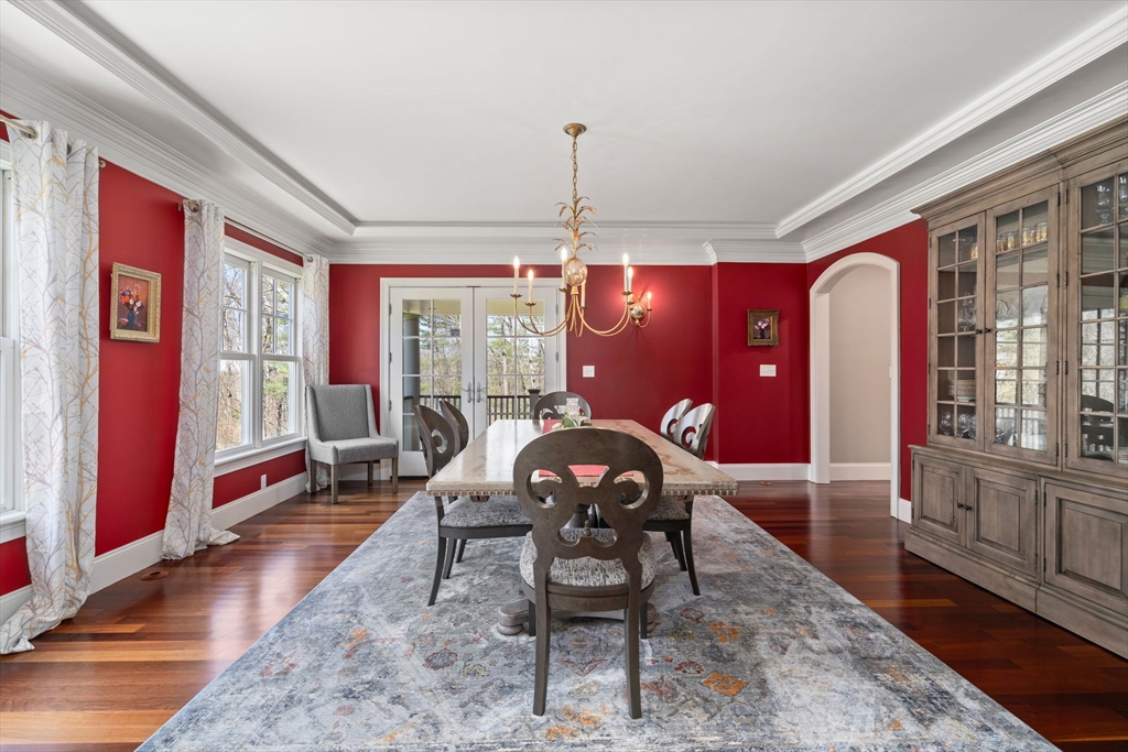 47 Brewster Road Sudbury, MA 01776 - Photo 13 of 41 a living room with furniture a rug and wooden floor
