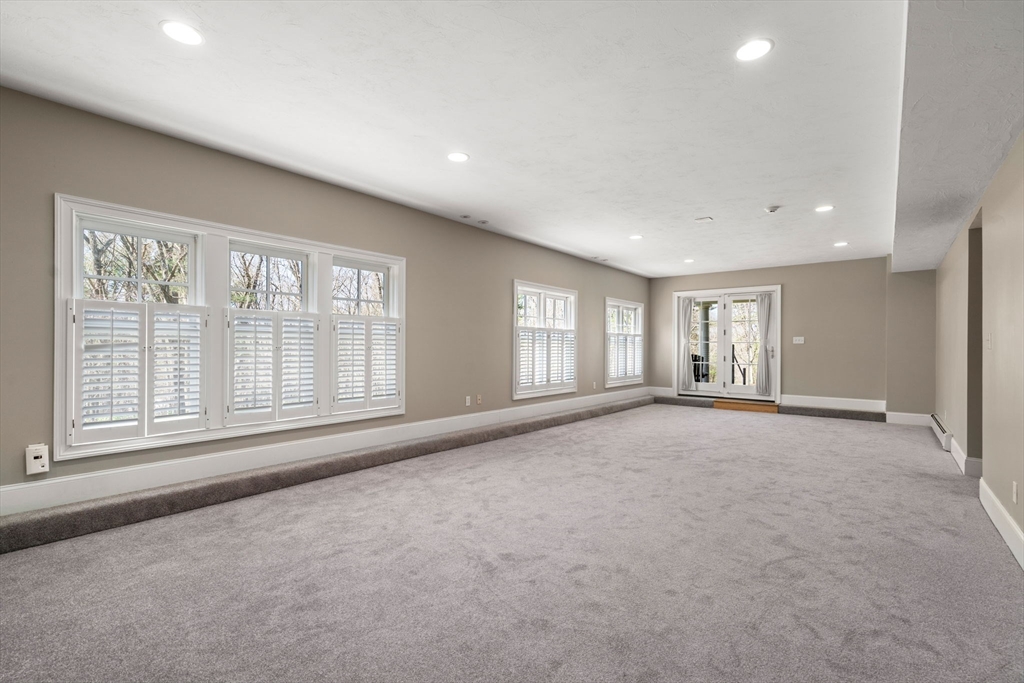 47 Brewster Road Sudbury, MA 01776 - Photo 34 of 41 a view of an empty room with a window