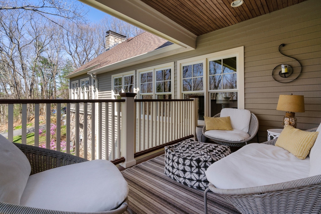 47 Brewster Road Sudbury, MA 01776 - Photo 41 of 41 a view of two chairs in the balcony