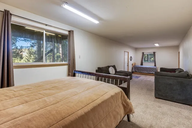 a view of a balcony with table and chairs