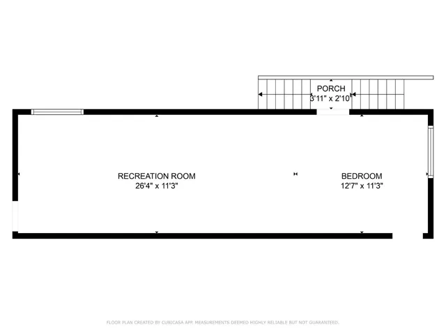 a view of a swimming pool with lawn chairs under an umbrella