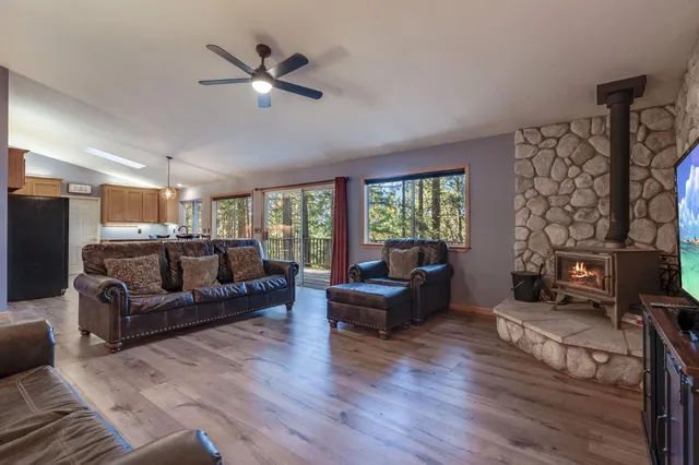 a living room with furniture or couches and a fireplace