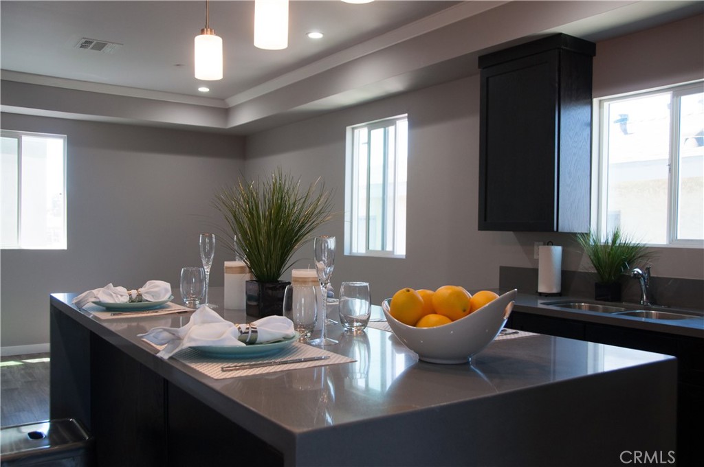 20520 1/2 South Western Avenue Torrance, CA 90501 - Photo 3 of 6 a view of a dining room with furniture and chandelier