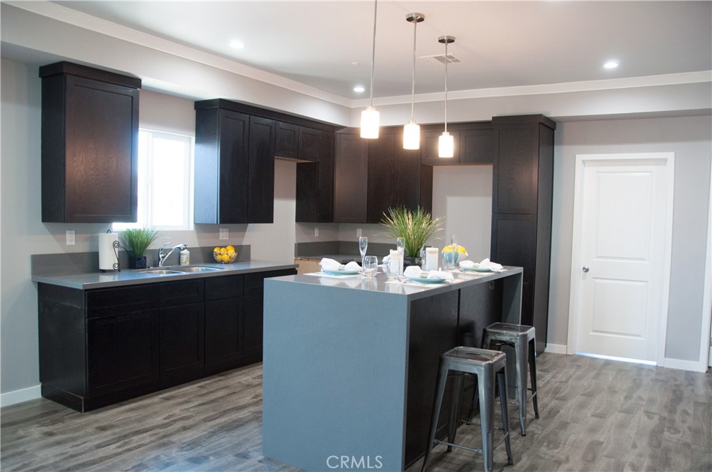 20520 1/2 South Western Avenue Torrance, CA 90501 - Photo 4 of 6 a room with a table and chairs in it